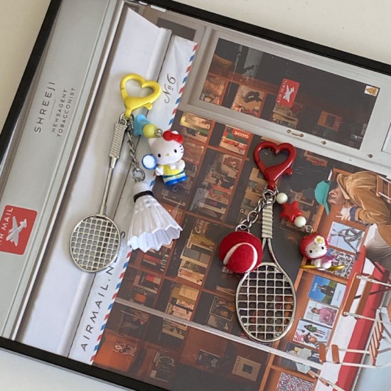 Homemade creative table tennis, badminton, KT doll keychain, cartoon sports game racket series bag charm for couples. Homemade creative table tennis, badminton, KT doll keychain, cartoon sports game racket series bag charm for couples.