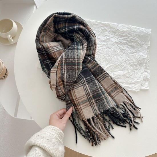 A new winter women's scarf with a wave pattern and tassels, a high-end, versatile and warm scarf. A new winter women's scarf with a wave pattern and tassels, a high-end, versatile and warm scarf.