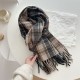 A new winter women's scarf with a wave pattern and tassels, a high-end, versatile and warm scarf. A new winter women's scarf with a wave pattern and tassels, a high-end, versatile and warm scarf.