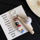 Homemade creative table tennis, badminton, KT doll keychain, cartoon sports game racket series bag charm for couples. Homemade creative table tennis, badminton, KT doll keychain, cartoon sports game racket series bag charm for couples.