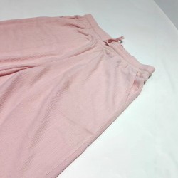 Women's suit: New solid color square-neck, long-sleeved, gathered, side-slit top, T-shirt, women's casual two-piece trousers. Women's suit: New solid color square-neck, long-sleeved, gathered, side-slit top, T-shirt, women's casual two-piece trousers.
