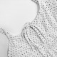 French retro polka dot halter neck lace-up vest for women, new summer vacation-inspired slimming top, two-piece set.