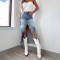 Amazon cross-border 2025 Spring new high-waisted, irregular, raw-edge denim skirt for women, distressed and washed.