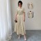 European and American women's polka-dot retro short-sleeved maxi dresses with a belt and decorative buckle for a slimming, fashionable dress.