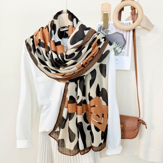 New European and American leopard print bow-knotted long scarves, versatile, high-end thin outerwear shawls for women, wholesale. New European and American leopard print bow-knotted long scarves, versatile, high-end thin outerwear shawls for women, wholesale.