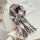 A versatile pink dotted plaid scarf for autumn and winter, perfect for couples, with a tasseled design for warmth. A versatile pink dotted plaid scarf for autumn and winter, perfect for couples, with a tasseled design for warmth.