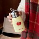 Cartoon KT penguin stainless steel thermos, black mini portable cold storage cup, cute and compact pocket cup