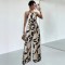2025 Spring/Summer European and American style wide-leg trousers for women, fashionable printed waist-slimming halter-neck jumpsuit for women.