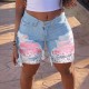 2025 spring and summer new European and American cross-border patchwork denim shorts for women, stylish streetwear ripped straight-leg mid-length pants in stock
