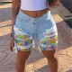 2025 spring and summer new European and American cross-border patchwork denim shorts for women, stylish streetwear ripped straight-leg mid-length pants in stock