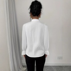 European and American women's shirts for Spring/Autumn 2025: French-style long-sleeved top with a 3D bow detail.
